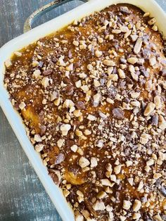 a casserole dish with nuts and chocolate in it