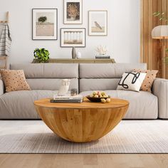 a living room filled with lots of furniture and pictures on the wall above it's coffee table