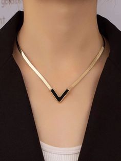 All In Black Necklace is an ideal choice for the fashionista who wants to make a bold statement. Its classic black design makes it both timeless and stylish, sure to complement any outfit. It's perfect for adding just the right amount of flair to your ensemble. Length 16.1"-18.9" Due to monitor differences, actual colors and/or patterns may vary slightly from online. Luxury Modern Dangle Necklaces, Luxury Minimalist Snake Chain Necklace For Formal Occasions, Luxury Formal Clavicle Chain Necklace, Luxury Elegant Office Jewelry, Luxury Black Long Necklace, Luxury Black Lariat Necklace Gift, Elegant Black Luxury Lariat Necklace, Modern Luxury Office Jewelry, Vee Line Necklace