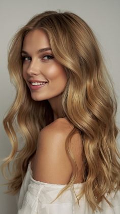 Discover the radiant beauty of honey blonde hair in our latest blog post This stunning shade blends golden tones with darker undertones creating a versatile look that suits every season Whether you prefer bright inspiration or something more subdued our guide covers all the different styles from vibrant honey balayage to soft light aesthetics Explore gorgeous braided hairstyles that can enhance your curls or find perfect short hair options that showcase this lovely color Whet Kelly Clarkson Blonde Hair, Honey Blonde Hair No Highlights, Cool Tone Honey Blonde Hair, Chestnut Brown Hair With Honey Blonde Highlights, Copper Golden Honey Blonde Hair, Dark Blonde Honey Hair, Honey Brunette Hair Caramel, Light Caramel Blonde Hair