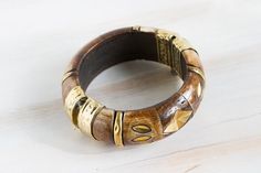 Vintage Brown Brass Carved Horn Bangle, Vintage Bracelet, Rustic Bracelet , Hippie Bangle, boho trib Bohemian Handmade Brown Bangle, Handmade Brown Bohemian Bangle, Handmade Bohemian Brown Bangle, Adjustable Brown Bohemian Bangle, Adjustable Bohemian Brass Bangle, Bohemian Brown Brass Bracelet, Bohemian Brown Brass Bracelets, Unique Brass Bangle For Festival, Bohemian Bronze Brass Bangle