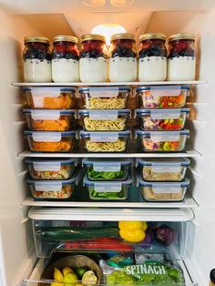 an open refrigerator filled with lots of food