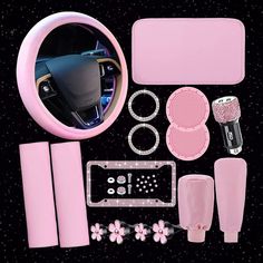 the contents of a car are shown in this image, including pink and black accessories