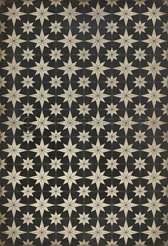 a black and white pattern with stars in the middle, on top of a dark background