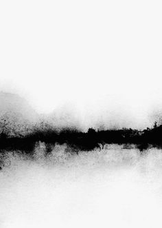 a black and white photo of water with trees in the distance on a foggy day