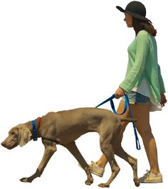 a woman walking her dog on a leash with a hat and green sweater over it