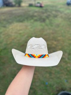 White Beaded Hat Band For Rodeo, White Beaded Hat Bands For Rodeo, Adjustable Beaded Fedora Hat Band, White Beaded Hat Bands For Festival, Beaded Curved Brim Hat, Wide Brim Beaded Hat For Country Events, Southwestern Beaded Brimmed Hat, Artisan Beaded Adjustable Hats, Adjustable Multicolor Ranch Hats