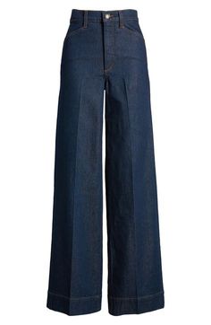 A refined way to wear denim, these crisply pressed, softly structured jeans feature a clean dark wash, a super-high waist and floor-sweeping wide legs. 32" inseam; 23" leg opening; 12" front rise; 15 1/2" back rise (size 29) 59% cotton, 20% lyocell, 20% recycled lyocell, 1% elastane Machine wash, tumble dry Imported Wash Out Jeans, Elegant High Rise Cotton Flare Jeans, Wide-leg Jeans For Work In Medium Wash, Wide-leg Denim Jeans For Work, Chic Dark Wash Full-length Jeans, Dark Wash Wide Leg Jeans For Work, Chic Dark Wash Wide Leg Jeans, Wide Leg Dark Wash Jeans For Work, Medium Wash Wide-leg Flare Jeans For Work