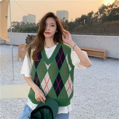 Product Information:Vest type: knitted vest vestStyle: VintageStyle: HedgingLength: ordinary style (50cm＜lengthâ‰?5cm)Whether hooded: not hoodedPattern: GeometricSize Information:Size: one size Size（cmï¼?/th> Length Bust One size 54 96 Trendy Green Sweater Vest For Winter, Green Casual Vest For Fall, Casual Green Vest For Fall, Green V-neck Vest For Winter, Trendy Green Vest For Fall, Trendy Knitted Winter Vest, Trendy Green Cotton Sweater Vest, Trendy Green Winter Vest, Trendy Blue Winter Vest