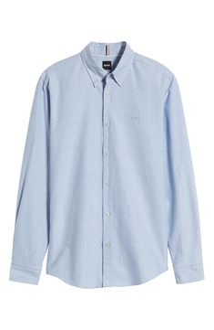 Comfortable and versatile, this solid-color shirt tailored from soft cotton looks great whether you wear it tucked or untucked. Front button closure Button-down collar Long sleeves with button cuffs 100% cotton Machine wash, dry flat Imported Slim Fit Cotton Shirt With Spread Collar, Casual Cotton Button-up Dress Shirt, Spring Cotton Dress Shirt With Placket, Relaxed Fit Cotton Dress Shirt, Business Cotton Button-up Shirt, Slim Fit Cotton Button-up Shirt, Cotton Business Shirt Button-up, Relaxed Fit Cotton Business Shirt, Casual Cotton Dress Shirt With Spread Collar