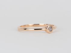 ♥ A dainty band set with a small pink diamond in a perfect bezel set♥ This is a natural earth-mined pink diamond. It has inclusions but is very brilliant and has a nice pink color.♥ Due to the rarity of pink diamonds, we are unable to take custom orders using pink diamonds. ♥ Material: 14K rose gold ♥ Ring size: US Size 5.5 and 6.25 (Free resizing up or down 1 size) ♥ Band width: 1.1-1.2mm ♥ Gemstone: The ring head measures about 4mm, the diamond is about 0.1ct ♥ All gemstones used are genuine, Dainty Band, 14k Rose Gold Ring, Natural Earth, Unique Wedding Bands, Diamond Cluster, Pink Diamond, Bezel Setting, Rose Gold Ring, Pink Color