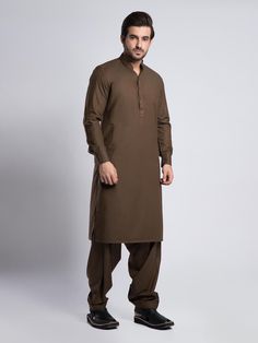 Mens Brown Plain Shalwar Kameez Mens Eid Shalwar Kameez Color: Brown Fabric: Wash and wear Dress Type: Handmade Please beware when you're choosing the variations of this dress. Feel free to discuss any issue regarding your order. You'll get a quick solution and will be satisfied. Unstitched Brown Lawn Suit With Dabka Details, Brown Unstitched Dabka Suit, Brown Unstitched Suit With Dabka For Eid, Brown Kurta For Eid, Eid Brown Unstitched Suit With Dabka Detailing, Brown Lawn Suit For Eid, Formal Brown Kurta For Eid, Brown Bollywood Style Unstitched Salwar Kameez, Bollywood Style Brown Unstitched Salwar Kameez