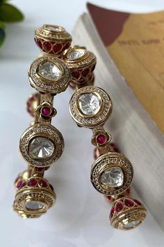 Gold polished bangles with stones and kundan embellishments. - Aza Fashions Bangles With Stones, Pink Stones, Bangle Set, Gold Polish, Bangles Jewelry, Pink Stone, Aza Fashion, Embellishments, Bangles