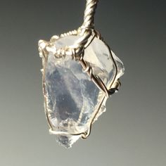 Aquamarine Sterling Silver Sire Wrap Pendant with solid silver chain.   Aquamarine has long been revered for its powers of positive influence and protection. It has a strong association with water, and the metaphorical qualities associated with water.  Going with the flow, clarity, peace and serenity, and cleansing among others.  It is said to alleviate sinus and lung problems, allergies and other respiratory conditions, and even said in folklore to help purify the air around you if kept on your Ethereal Silver Crystal Necklace As A Gift, Ethereal Silver Crystal Necklace Gift, Spiritual Hand Wrapped Silver Necklace, Spiritual Hand-wrapped Silver Necklaces, Mystical Silver Crystal Necklace For Meditation, Celestial Silver Crystal Necklaces For Healing, Spiritual Silver Crystal Necklace Hand Wrapped, Going With The Flow, Wire Wrap Pendant