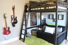 a bunk bed sitting next to a green carpeted floor in a room with guitars on the wall