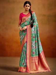 Enhance your ethnic wardrobe with our stunning green kalamkari printed banarasi silk saree! This exquisite saree is crafted from high-quality Banarasi silk material, known for its lustrous texture and elegant drape. The beautiful green color adds a touch of vibrancy and freshness, making it a perfect choice for weddings, festivals, and other special occasions.
Kalamkari is a traditional art form that involves hand-painting or block-printing intricate designs on fabric. The kalamkari prints on th Saree Floral, Indian Saree Blouse, Simple Sarees, Kalamkari Saree, Banarasi Silk Saree, Green Saree, Trendy Sarees, Latest Sarees, Tussar Silk Saree