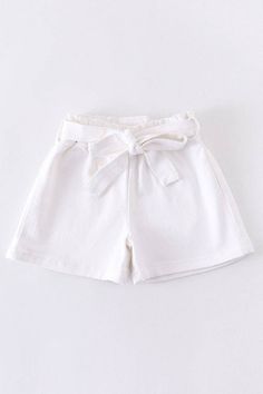 How precious are these!? The cutest staple for your little one! Runs large, we suggest sizing one size down Cute White School Bottoms, Cute Cotton Shorts In Solid Color, Cute Summer Shorts For School, Cute White Vacation Shorts, Chic Summer School Bottoms, Cute White Cotton Shorts, Playful White Shorts For School, Denim Paperbag Shorts, Denim Paper