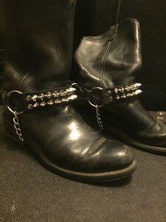 A pair of bootstraps one black premium leather two row tall cones Biker Gear, Philadelphia Pa, Chukka Boots, Biker Boot, Boots Men, Style Icons, The Row, Philadelphia, Classic Style