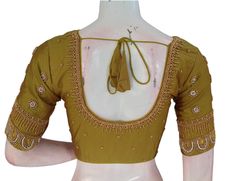 Indulge in the beauty of nature with our elegant olive green blouse featuring intricate Aari handwork. The delicate embroidery adds a touch of sophistication and elegance to this timeless piece. Perfect for weddings, festivals, or special occasions, pair it with a saree or lehenga for a stunning ensemble. * This Is A Fully Stitched Saree Blouse, Ready To Wear * Made of Semi silk, Lined With Cotton * Opens From Front With Hook and eye-fitting MEASUREMENTS: Sleeve: 10 inches  Size: 38,40,42 Blouse Elegant Pista Green Blouse With Zari Work, Elegant Embroidered Pista Green Blouse, Olive Green Blouse, Sari Blouse, Blouse Length, Bridal Saree, Saree Blouse, Handmade Design, Olive Green