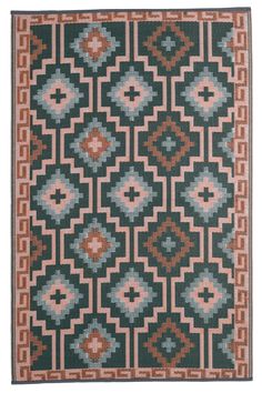 an area rug with various colors and patterns