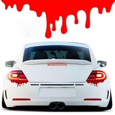 a white car with red dripping paint on it