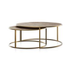 two tables with gold metal bases and marble tops, one on each side is a round table