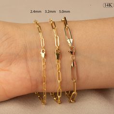 PLEASE READ FULL DESCRIPTION & SHOP POLICIES 14K Gold Paperclip Bracelet / Gold Paper Clip Chain Bracelet / Gold Layering Chain Bracelet / 14k Gold Chain Bracelet / Chain Link Bracelet ★★ Description ★★ Experience the modern elegance of our 14K Gold Paperclip Bracelet, a chic and versatile piece perfect for any occasion. Meticulously handcrafted from real 14K solid gold, this bracelet offers a sleek and contemporary look. Available exclusively in gold, it features a semi-hollow paperclip chain t Gold Paperclip Bracelet Tarnish Resistant, Gold 14k Paperclip Bracelets, 14k Gold Paperclip Bracelets, 14k Gold Link Charm Bracelet With Lobster Clasp, Paperclip Bracelet, Gold Chain Bracelet, Bracelet Chain, Gold Paper, Minimalist Bracelet