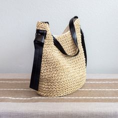 New style! Straw woven shoulder bag perfect for all occasions. This bag provides a unique combination of style, convenience, and durability. It's an ideal choice for days out, special events, and everyday wear. Magnetic button closure. Fully lined with inner pocket. Dimensions: 11"H x 14"W x 6"D 10" handle drop Designer Style ID: 8456 Versatile Bucket Hobo Bag With Braided Handles, Trendy Woven Satchel Hobo Bag, Trendy Woven Hobo Bag Shaped Like A Satchel, Spring Natural Woven Leather Shoulder Bag, Eco-friendly Bucket Bag With Braided Handles, Trendy Woven Hobo Shoulder Bag, Summer Everyday Handwoven Hobo Bag, Trendy Woven Bucket Shoulder Bag, Chic Basket Shoulder Bag With Adjustable Strap