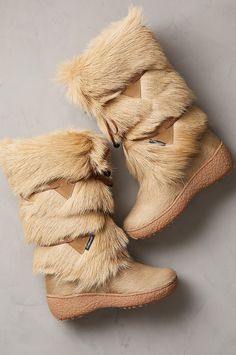 Gone are the days when you had to choose between styled or weatherproofed. The Anna boots let you have it all in winter footwear that's fashioned for beauty and built to conquer the elements. Handcrafted in a premium goat fur shaft, this feminine boot features a soft, smooth, calfskin hair-on leather shoe in fine contrast to the fluffy goat fur shaft that's detailed with a leather lace-up front. Our snow-proof, water-repellent boot features a genuine wool lining throughout the shaft, shoe and fo Anna Boots, Fluffy Goat, Feminine Boots, Apre Ski, Bling Crocs, Waterproof Suede Boots, Women's Winter Boots, Winter Boots For Women, Winter Footwear