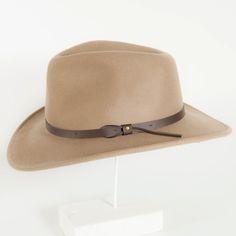 Embrace the allure of adventure with the Pathfinder Mens Wool Felt Outback Hat. Crafted from luxurious wool felt, this hat features an adjustable velcro strap for a perfect fit and a teardrop crown for a touch of sophistication. Perfect for any outdoor excursion, this hat is ready for whatever paths you may wander. Featuring a sewn-in sweatband with a unique hidden pull strap tightening system for a one of a kind fit! Plus we’ll include two adhesive size reducers for an even more custom experien Rugged Outdoor Fedora With Flat Brim, Classic Brown Hat For Outdoor Activities, Outdoor Fedora Felt Hat, Outdoor Felt Fedora Hat, Brown Hat For Fall Outdoor Activities, Rugged Fedora Hat For Outdoor, Brown Hat For Outdoor Fall Activities, Outdoor Fur Felt Hat With Flat Brim, Winter Outdoor Felt Hat