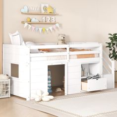 a child's bedroom with a loft bed and white bunk beds for the kids