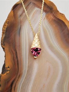 "CJ045 Whimsical, fun, classy. Pine cone? Tree? Ice cream cone? What do you see? This 14k gold pendant is set with approximately .75ct trillion cut Maine pink tourmaline. Dimensions of the pendant is 17mmx6.5mm. Sold with an 18\" 14k gold chain. Original design by Dennis Creaser. This piece is available in 14k yellow or white gold." Pine Cone Tree, Pink Tourmaline Necklace, Fancy Jewelry Necklace, Tourmaline Jewelry, Tourmaline Necklace, What Do You See, Pretty Jewelry, Fancy Jewelry, Rose Gold Jewelry