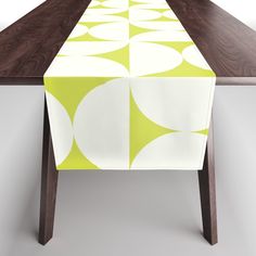 a table with a green and white design on it