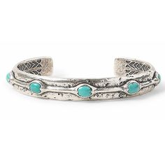 Vibrant blue turquoise stones bring a playful energy to a simple cuff bracelet design, creating the TURQUOISE CUFF for Men from menswear icon John Varvatos. The solid sterling silver cuff features John Varvatos' signature distressed pattern, giving it a design that resembles an ancient artifact. The naturally formed coloration of the turquoise stones means no two Turquoise Cuff Bracelets will look exactly the same - giving you a truly unique style. Size: Cuff bracelet is designed for a 7-8 inch Simple Cuff Bracelet, Turquoise Jewelry Western, Silver Bracelet For Men, Mens Designer Jewelry, Seasonal Living, Native American Bracelets, Mens Bracelet Silver, Turquoise Bracelet Cuff, Handcrafted Bracelets