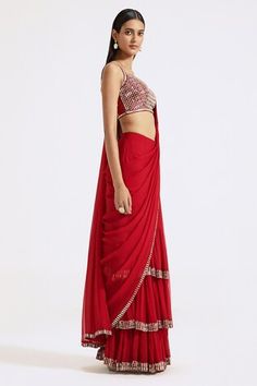 Red pre-draped saree with contrast cutdana beaded border. Paired with a padded silk blouse with all over mirror and zari embroidery. - Aza Fashions Evening Red Pre-draped Saree With Sheer Dupatta, Draped Saree For Evening Festivals, Evening Saree For Festivals, Draped Style, Evening Saree For Festivals, Red Pre-draped Saree With Sheer Dupatta For Evening, Red Draped Lehenga For Festive Occasions, Red Pre-draped Saree For Reception, Red Floor-length Pre-draped Saree For Reception, Festival Evening Pre-draped Saree