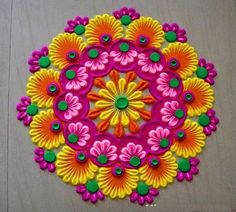 a colorful circular design made out of paper