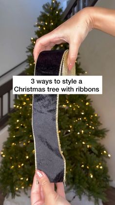 someone is holding a christmas tree with ribbons in front of a christmas tree and the words 3 ways to style a christmas tree with ribbons