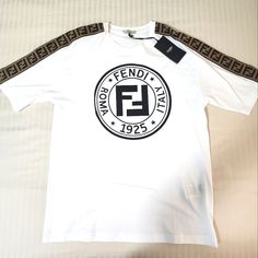 White Cotton T-Shirt From Fendi -Regular Fit T-Shirt -Crew Neck -Short Sleeves -Graphic Print -Ff Zucca Monogram From Shoulder To Sleeves -Fits True To Size -100% Cotton -Made In Italy Monogram T, Fendi Shirt, Monogram T Shirts, Classic Shirt, Shirt Men, Shirt Color, Cotton T Shirt, White Cotton, Cotton Tshirt