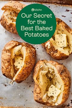 four baked potatoes on a baking sheet with the words our secret for the best baked potatoes