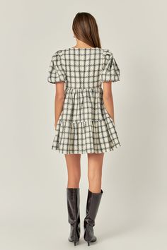 Attention all fashionistas! This season, we're all about the tweed mini gingham dress. Classic and timeless, this little number is perfect for any event. With puff short sleeves and a square neckline, it's both stylish and comfortable. Dress it up or down, either way, you'll look amazing. Add our Tweed Mini Gingham Dress to your shopping list today! Check tweed Puff short sleeves Mini length Square neckline Center back zipper Side seam pocket Lining Hand wash cold Do not bleach Do not tumble dry Side Seam Pocket, Summer Style Guide, Casual Party Dresses, Knit Outerwear, Your Shopping List, Pink Midi Dress, Gingham Dress, Geek Chic, Comfortable Dress