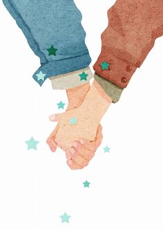 two people holding hands with stars on them