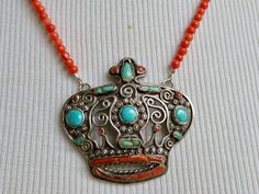 "This Matilde Poulat brooch has been repurposed into a pendant with vintage Italian coral gemstone beads for the necklace. The brooch Matl's 'crown' design in filigree, with coral and turquoise set stones. this piece is very old and I place it circa 1930's-40's. It is a higher than sterling silver content at 930. The piece is in very good condition for its age and these crowns are very hard to find in such good condition. Hallmarked Matl, Mexico, 930. The coral necklace is from a lot of coral I Ornate One-of-a-kind Pendant Necklace, Unique Pendant Necklace With Brooch Detail, Bohemian Crown Shaped Jewelry Gift, Morganite Necklace, Morganite Jewelry, Mexican Silver Jewelry, Coral Gemstone, Coral Bracelet, Tourmaline Bracelet