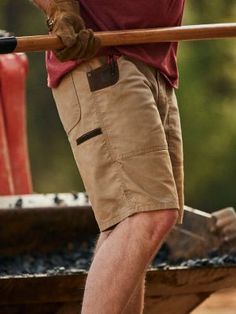 A SUMMER WARDROBE MADE FOR FUNCTION Those hot summer days can make the workday feel even longer than usual. Get your work wardrobe updated for the warm weather ahead with the Wrangler® RIGGS WORKWEAR® work shorts. Comfortable, practical, and built to last, these men's shorts feature just enough stretch to keep you moving comfortably, a gusseted crotch for maximum mobility, front patch pockets, and CORDURA® fabric-lined back pockets. These function-first shorts are perfect for a summer wardrobe t Wrangler Shorts, Cheap Clothes Online, Work Shorts, Mens Cargo, Cargo Shorts Men, Fashion Catalogue, Work Wardrobe, Type Of Pants, Cheap Clothes