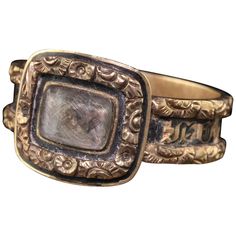 Beautiful Antique Victorian 14K Yellow Gold Engraved Black Enamel Mourning Ring. This gorgeous ring has engraved and enameling going around the entire ring. The center has an acrylic glass that is holding the hair in the center. The enamel has some loss to it but it is still in good condition. This does not have any engravings or dates in the ring. Item #R0747 Metal: 14K Yellow Gold Size: 7 1/2 Weight: 3.7 Grams Measurements: 11.4 mm wide Layaway: For your convenience, we will be happy to provid Gorgeous Ring, Gold Engraving, Antique Rings, Antique Victorian, Black Enamel, Antique Gold, Antique Jewelry, Band Rings, Dates