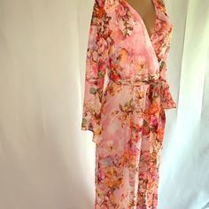 Full Length 100%Polyester Lined Maxi Dress Pink Wrap Maxi Dress For Spring, Long Chiffon Dress For Spring, Wrap Maxi Dress For Spring Daywear, Spring Chiffon Wrap Maxi Dress, Sheer Maxi Dress For Brunch, Sheer Chiffon Maxi Dress For Spring, Chiffon Maxi Dress With Floral Print And Surplice Neckline, Floral Print Wrap Dress For Party, Flowy Chiffon Wrap Maxi Dress