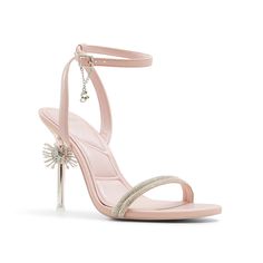 Aldo-x Wicked Spellbinding Sandal Make every moment magical with the Aldo x Wicked Spellbinding sandal. Inspired by Glinda's poppy pink, this pair is embellished with radiant rhinestone detailing, a wand as the stiletto, and a signature "G" charm on the ankle strap. Pillow Walk technology ensures superior comfort with dual density foam and padded insoles. Wicked Aldo Shoes, Light Pink Shoes, Diamond Heels, Pearl Shoes, Dance Heels, Crystal Shoes, Silver Spoon, Sneaker Dress Shoes, 25th Birthday