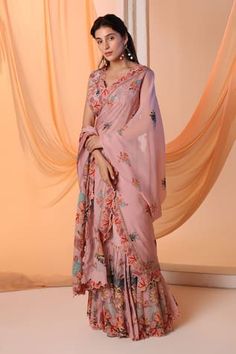 Pink pre-draped saree with floral print and sequins, beads, cutwork edged embroidery. Paired with coordinating padded cutwork edged blouse. - Aza Fashions Festive Pre-draped Dress With Dupatta, Pink Saree With Mirror Work, Pre-draped Saree With Zari Work, Silk Dresses With Mirror Work And Draped Shape, Pre-draped Saree With Mirror Work In Traditional Drape, Silk Draped Dupatta, Pre-draped Lehenga For Wedding, Draped Dupatta For Festivals, Fitted V-neck Pre-draped Saree