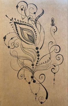 an artistic drawing on brown paper with swirls and dots in the middle, depicting a peacock