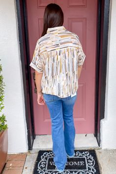 A mix of greys and browns make a beautiful combo! This top features a vertical striped print, collar, short sleeve and button front! Style It! Pair with denim and black booties for a cute outfit! Taupe, Chestnut, Mustard and Grey Short Sleeve Button Front Collar Model is wearing a small Runs True to Size 80% Rayon, 20% Nylon Materials may have natural variations Colors may vary from different viewing devices Casual Vertical Stripes Blouse For Day Out, Casual Collared Blouse With Vertical Stripes, Collared Tops With Vertical Stripes For Fall, Casual Vertical Stripes Blouse For Fall, Casual Blouse With Vertical Stripes For Spring, Casual Blouse With Striped Collar For Day Out, Casual Vertical Stripes Button-up Blouse, Casual Brown Tops With Striped Collar, Mustard And Grey