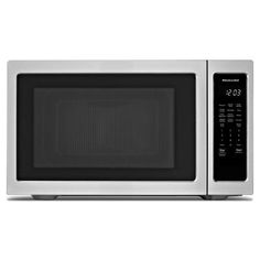 a microwave oven with the door open on a white background, it is silver and black